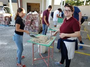 Two students mixing cement 